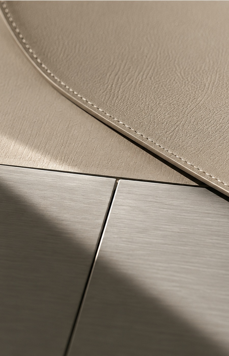 Leather and brushed aluminium study